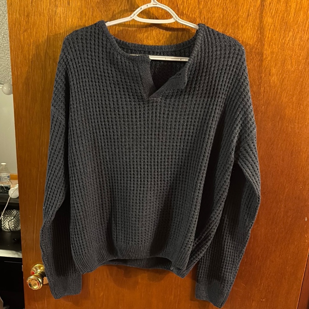 Woman’s Blue Sweater